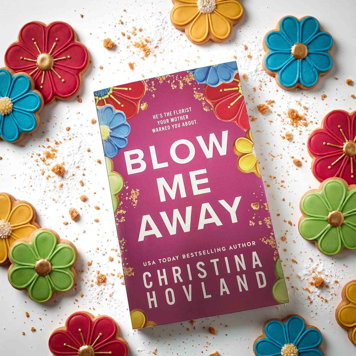 Blow Me Away Special Edition book, flat lay presentation, with cookies and crumbs as a background